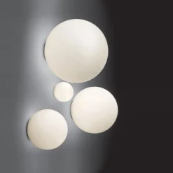 Artemide Dioskuri-vegglampe, IP44, Ø 14 cm| Design- Og Hotellbelysning|Vegglamper