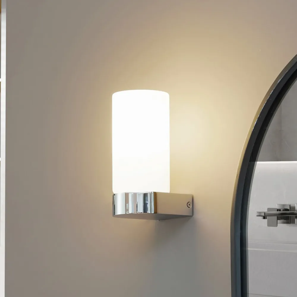 Lucande Basolo vegglampe til bad, krom, høyde 17,2 cm, glass| Vegglamper