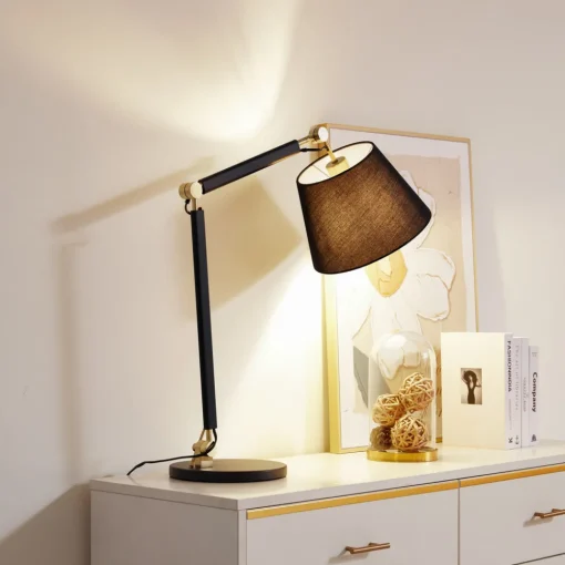 Lucande bordlampe Marvaine, svart/gullfarget, justerbar Online