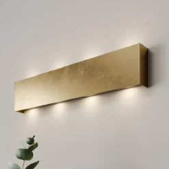 Quitani LED-vegglampe Maja, gull antik, bredde 54 cm| Vegglamper